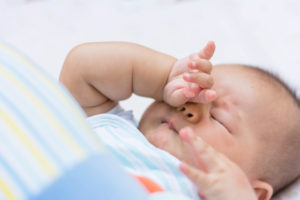 How Much Do Newborns Sleep? Newborn rubbing eyes