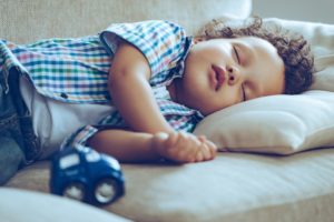 18-Month Sleep Regression baby napping on couch